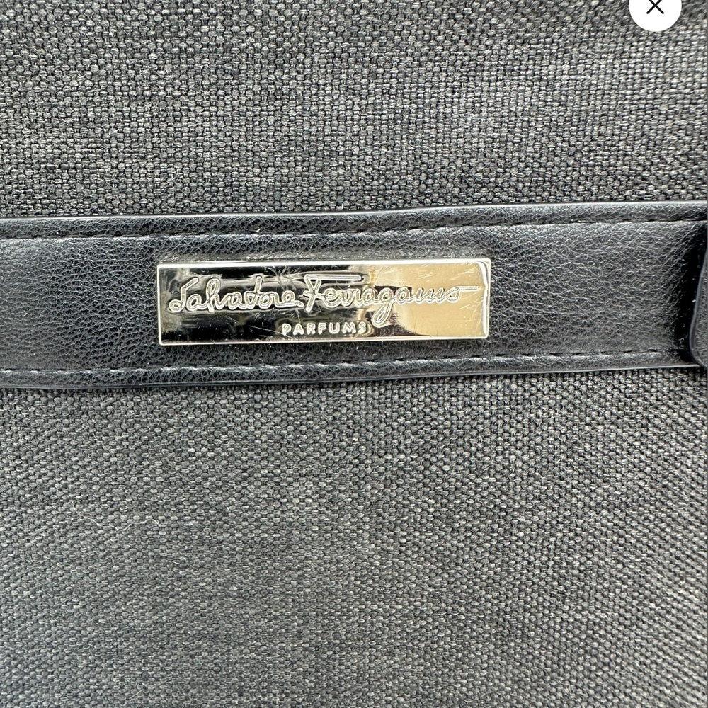 Salvatore Ferragamo, black and gray cosmetic bag.